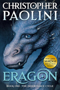 Cover of Eragon by Christopher Paolini, with a blue dragon staring out with intelligence and power.