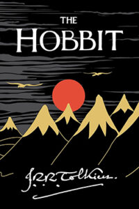 Cover of The Hobbit by J.R.R. Tolkien, with stylized mountains, a red sun, and flying birds.
